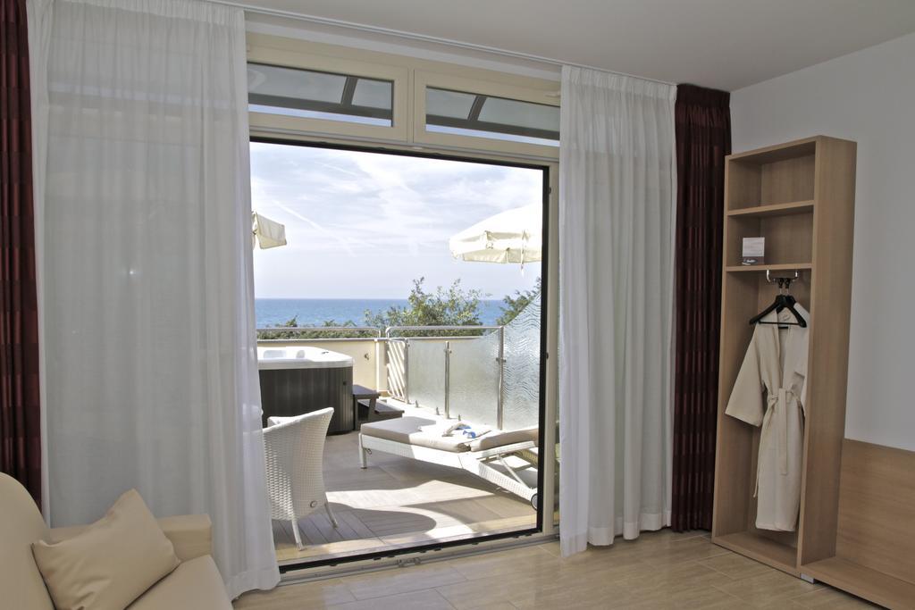 Hotel I Ginepri มาริน่า เด กาสตาเนโก การ์ดูชี ห้อง รูปภาพ